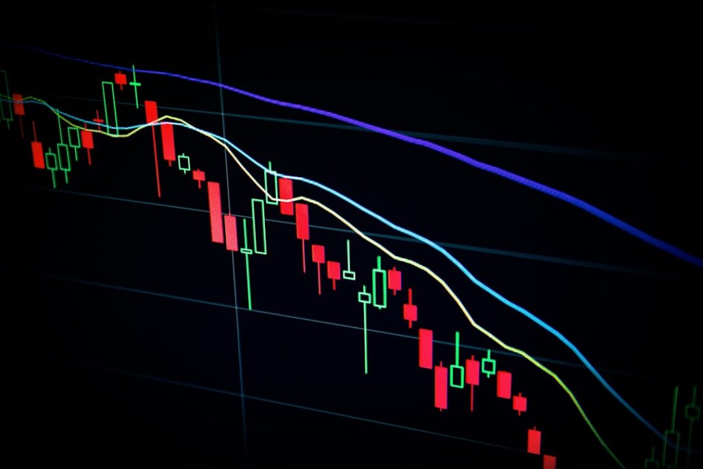 crypto trading bot — stock market candlestick chart on dark screen