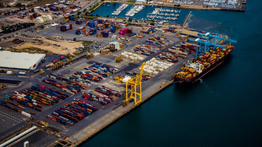 graceful shutdown — docked shipping ship on body of water