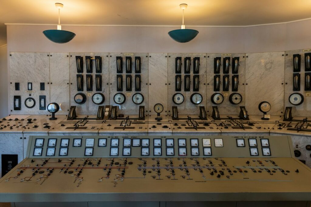 horizontal pod autoscaler — A large control room with lots of control knobs