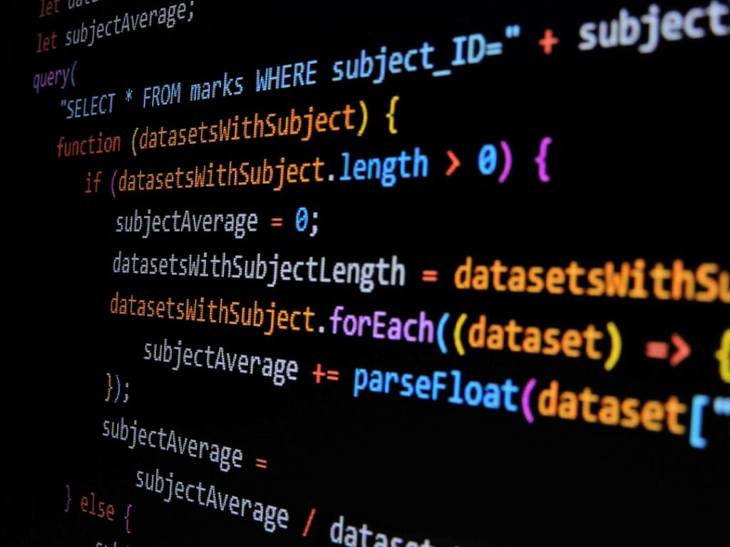 alpha — JavaScript code displayed on a dark screen with colorful syntax highlighting